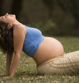 Flexible pregnant woman
