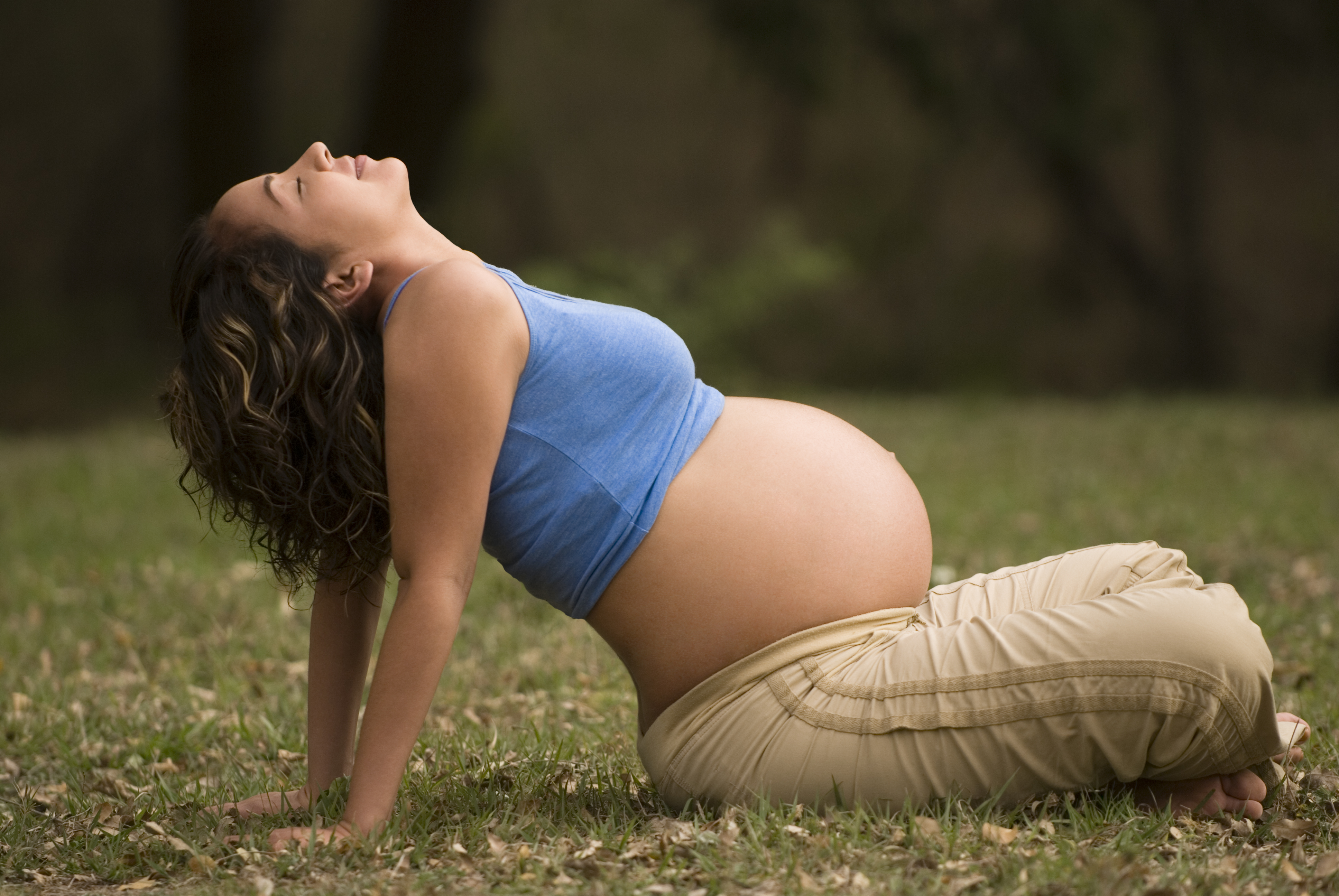 Flexible pregnant woman